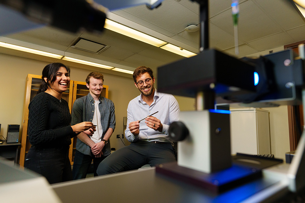 Marco Gerini-Romagnoli  working with students in a lab